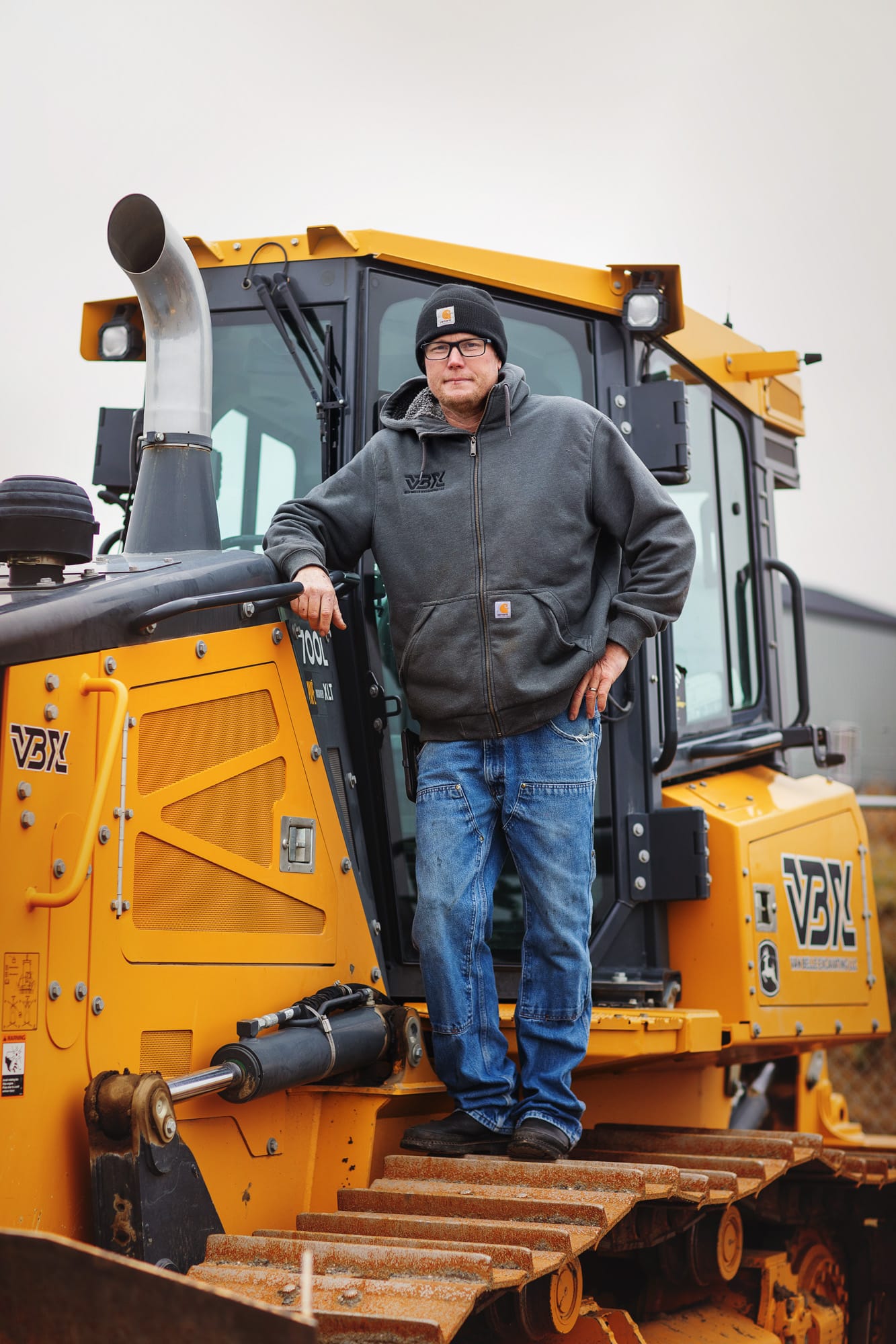 3F2A7393 VBX team member standing on heavy machinery