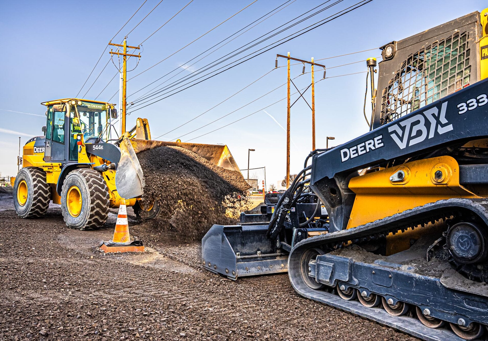 VBX_Website Shoot_03.2025-03757 bulldozer and skid steer working to move dirt